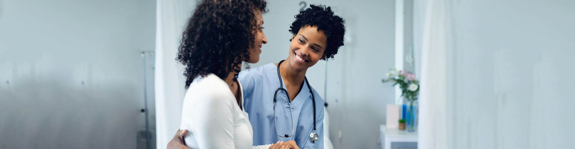 nurse assisting her patient